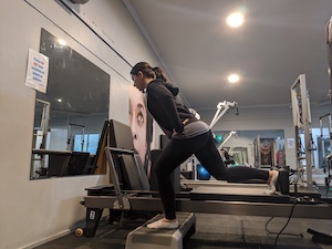 scooter on reformer as glutei exercise